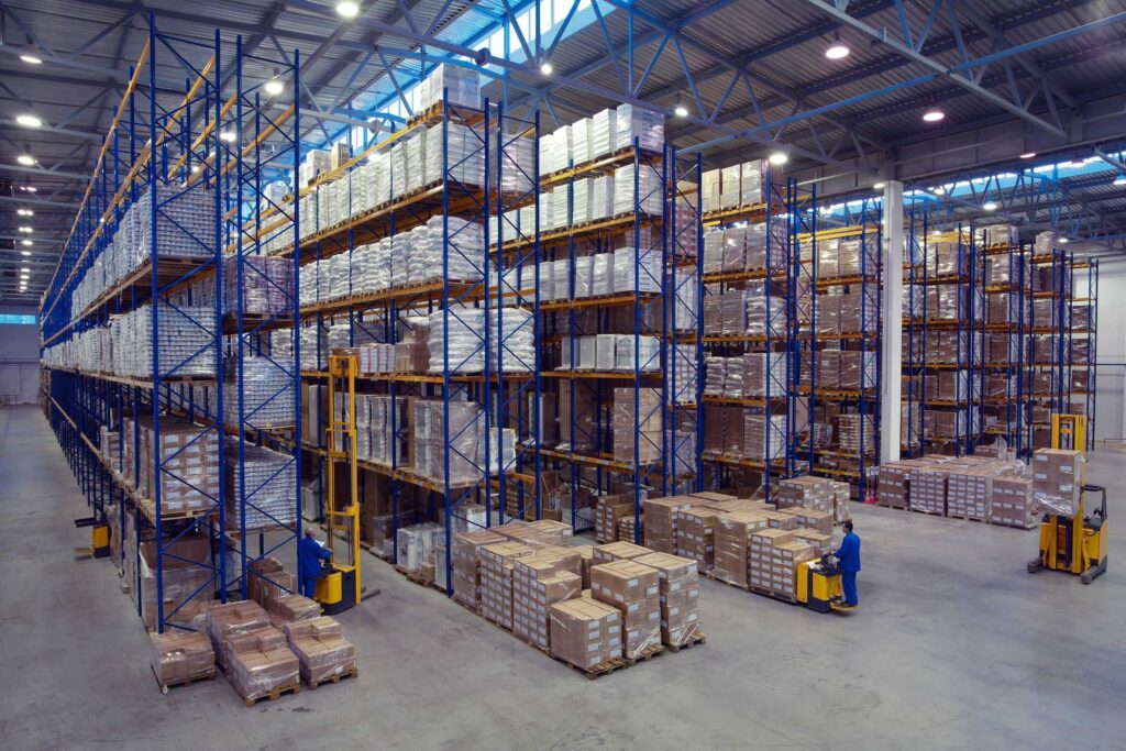 Stock image from Canva of warehouse racking to accompany article on warehouse project management