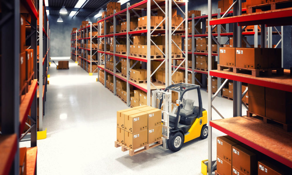 Stock image from Canva of a forklift picking goods to accompany article on warehouse layout design