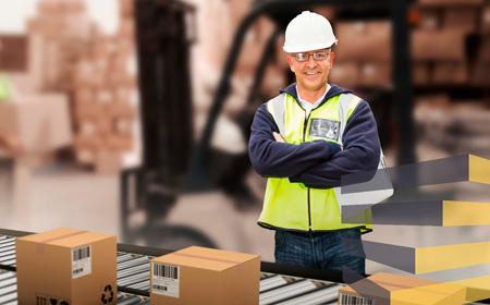 Man near to boxes in distribution centre to illustrate article on warehouse labeling in Brazil