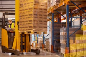 A forklift putting items in racking to illustrate an article on warehouse slotting optimization