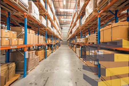 Aisle in storage facility to illustrate article on industrial warehouse cleaning in Brazil